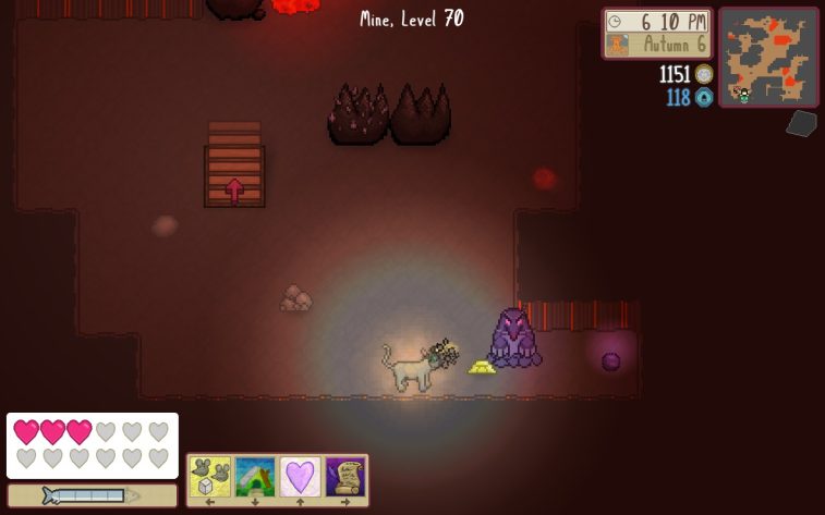 A gray and tan cat wearing a headlamp is exploring a mine, and is facing a strange purple mole ghost creature with red eyes. The cave is dark, labeled as level 70, and rocks and stairs can be seen. UI in the upper right shows information about the time, date, currency obtained, and a map of the mine floor. UI in the bottom left shows information about the protaganist's health, hunger, and skills.