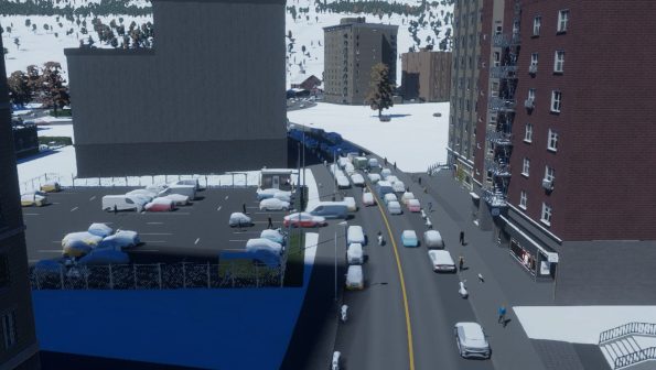 snow in the city, covering the building and traffic