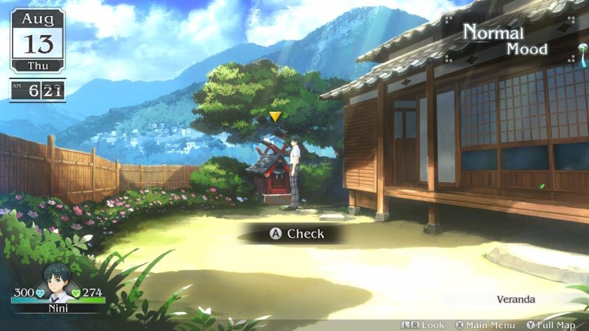 Nini is standing at the shrine in the backyard of the Oyama home