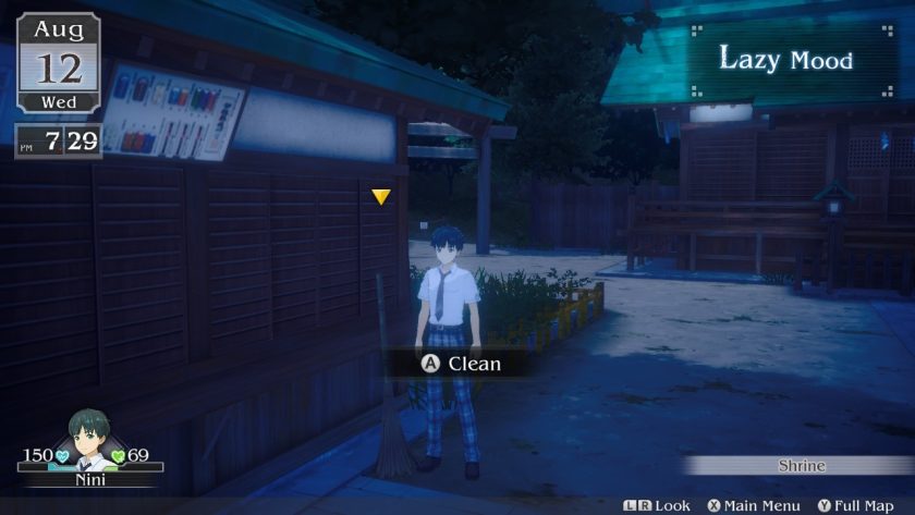 Nini is standing next to the broom at the location of the Shrine