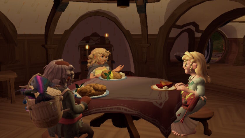 Three hobbit characters gather around a table in a cosy, wooden interior filled with warmth and charm. Plates of hearty food sit before them—fresh bread, vegetables, and a hint of dessert—while the maroon tablecloth and flickering candlelight add to the intimate setting. One character carries a basket of vibrant fish on their back, suggesting the meal is freshly caught. Lively conversation flows as Old Noakes exclaims, “Get on with it, Cotton. The fish will have died of…”, bringing humour and urgency to this laid-back moment in Tales of the Shire. Published on: LadiesGamers.
